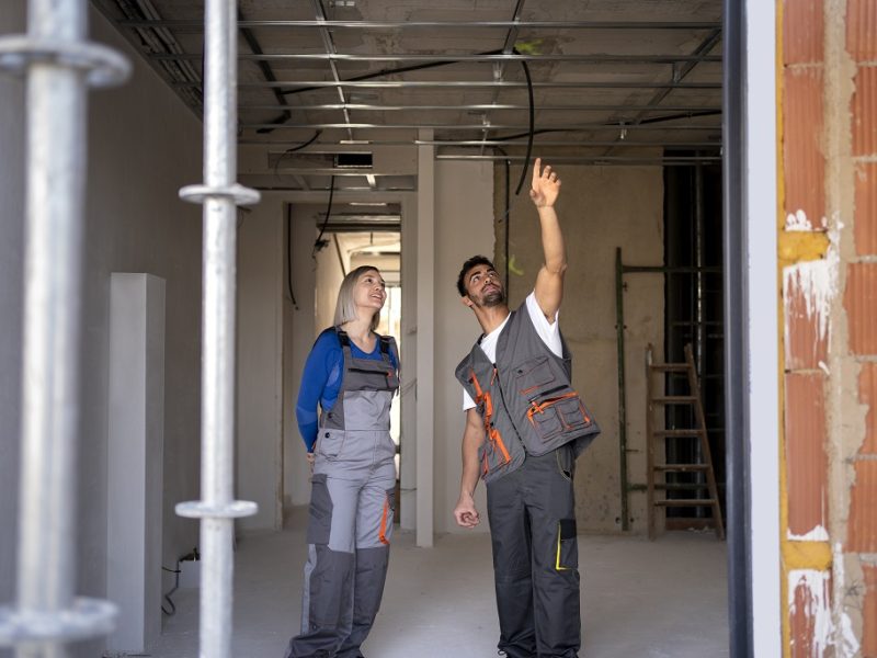 full-shot-smiley-construction-workers